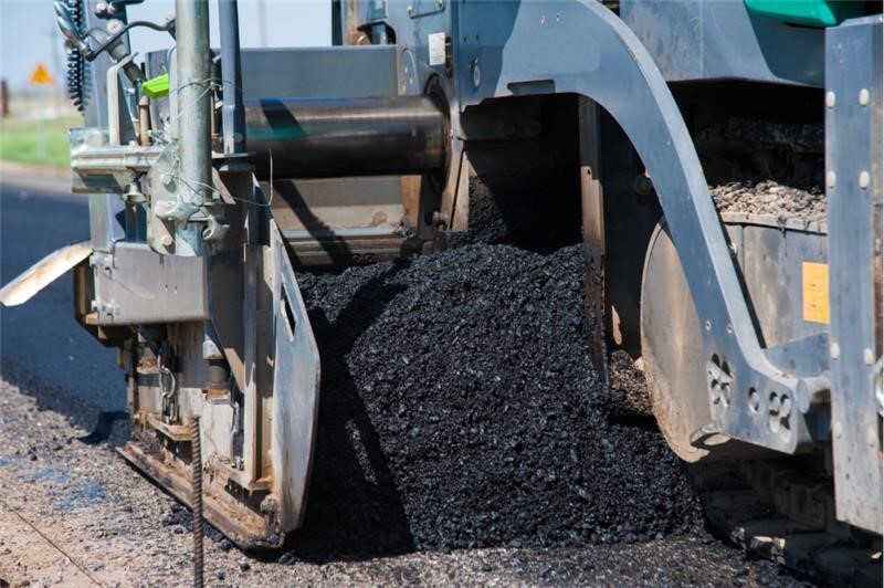 truck pouring asphalt